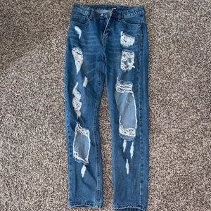 Distressed boyfriend jeans from FASHION NOVA